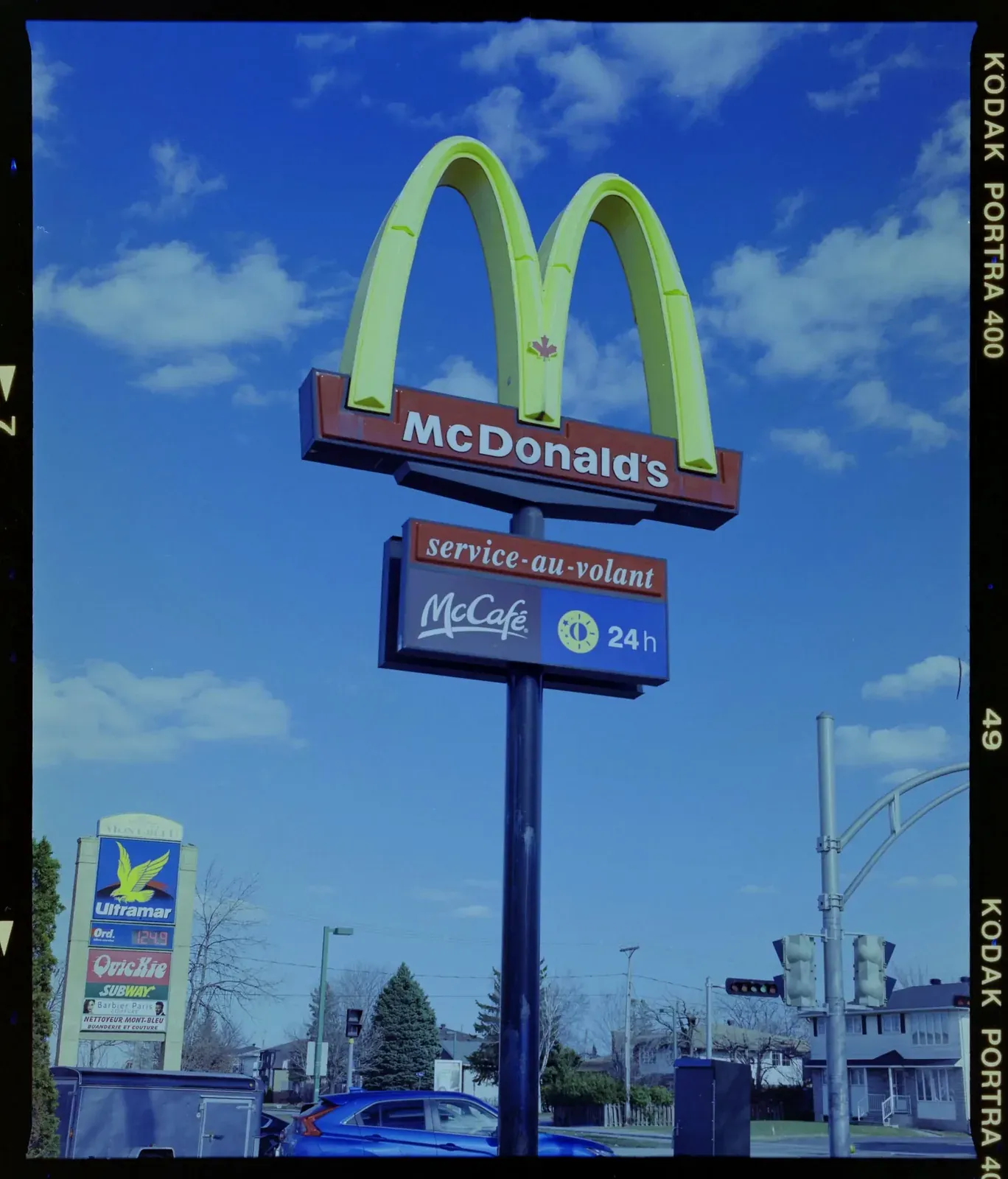 The same frame with the film base divided out before the invert: the film edge is black, but the picture is dark and still blue.