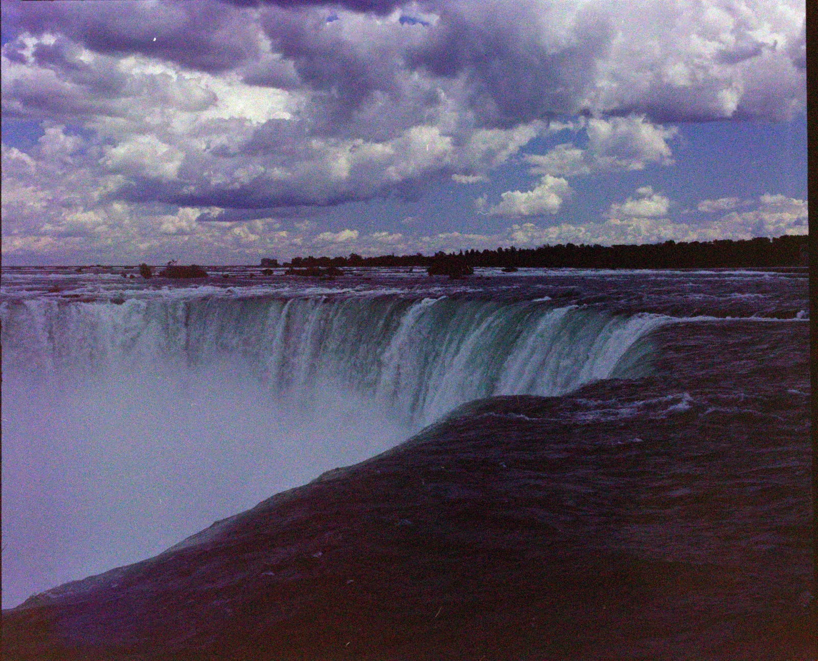 The edge of Niagara Falls under heavy clouds, converted with Overcast